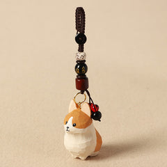 Carved Wood Corgi Om Mani Padme Hum Key… – Dog keychain with gold character bead, speckled stone bead, and red dangle, handc…