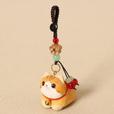 Wood Cat Keychain – Orange tabby cat with gold bell collar and carved flower bead, handcrafted charm