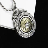 Double Dorje Vajra Rotatable Necklace – three-quarter silver medallion with gold mantra center, Tibetan pendant