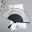 Plum Blossom Ink Fan – Black fan with ink wash plum blossoms on white paper, Chinese folding fan