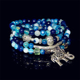 Natural Agate Elephant Buddha Bracelet – stacked blue agate beads with elephant charm, studio