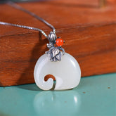 White Jade Elephant Lotus Necklace - Carved elephant pendant with silver lotus bail and carnelian on chain