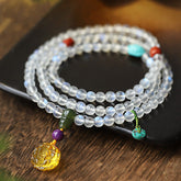 Moonstone Amber Turquoise Lotus Mala - Multi-strand moonstone bracelet with carved amber pendant, healing crystal