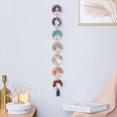 Chakra Tree of Life – seven crystal tree wall hanging in living room with plants, energy healing decor