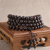 Sterling Silver Sandalwood Mantra Bracelet – 108 mala beads coiled on carved wood stand, prayer bead necklace