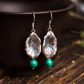 Sterling Silver Turquoise Lotus Leaf Earring - pair on ceramic vessel, nature-inspired