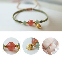 Red Agate Jade Lotus Bracelet – sage green gold cord with pink center bead and green side beads, lotus charm, composite detail layout