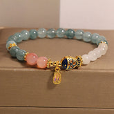 Jade Agate Koi Scripture Bracelet – full bracelet laid flat showing jade agate and koi fish beads