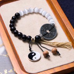 Cat's Eye Ebony Wood Yin Yang Bagua Coin Bracelet – Yin-yang beads on wooden tray, Bagua coin and tassel dangle