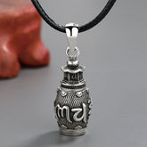 Om Mani Padme Hum Copper Pendant Necklace – Oxidized prayer wheel with mantra on black cord, Tibetan jewelry