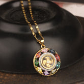 Zircon Copper Rotating Wealth Pendant – Antiqued silver openwork pendant with cubic zirconia gems, copper-gold rotating middle barrel on box chain, dark brown wood