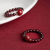 Garnet Cinnabar Ring – two rings red cinnabar bead PiXiu burgundy background, protection jewelry