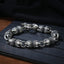 Dragon Claw Engraved Strength Protection Bracelet – Antiqued silver talon links on dark wood, gothic statement, Bold
