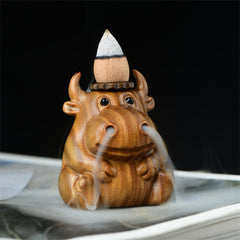 Green Sandalwood Backflow Incense Burner – Calf exhaling smoke downward, carved wood effect