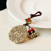 Feng Shui Yin Yang Bagua Keychain - Brass octagonal mirror with yin-yang and eight trigrams, feng shui