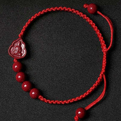 Cinnabar Laughing Buddha Guan Yin Bracelet – red macrame cord with Buddha cloud charm and four cinnabar beads, dark fabric
