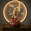 Buddha Lotus Backflow Incense Burner with glowing LED halo ring and cascading smoke on wood, meditation decor