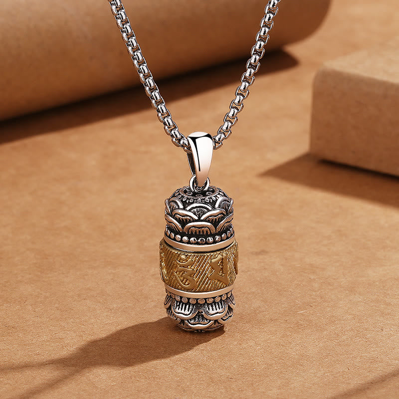 Om Mani Padme Hum Necklace Pendant – Two-tone silver and gold prayer wheel on kraft paper, spiritual jewelry