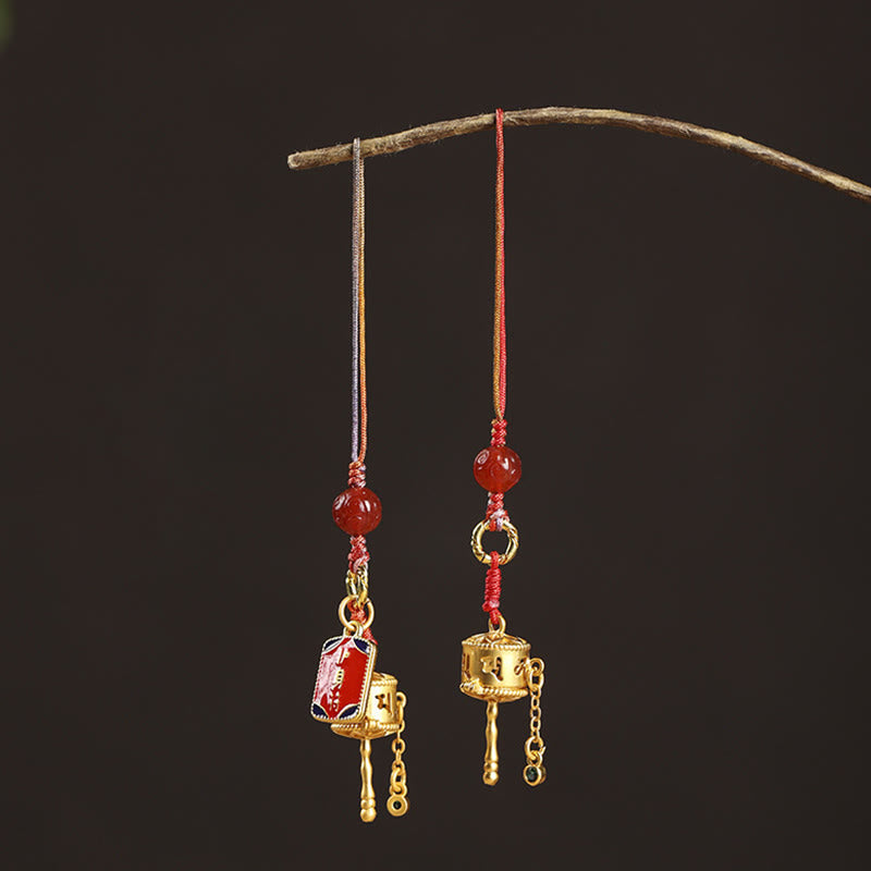 Prayer Wheel Phone Charm – Two charms hanging from wooden branch, Buddhist charm