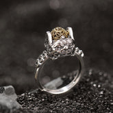 Sterling Silver PiXiu Wealth Ring – Silver ring with gold pixiu beast and coin orb on dark stone, feng shui