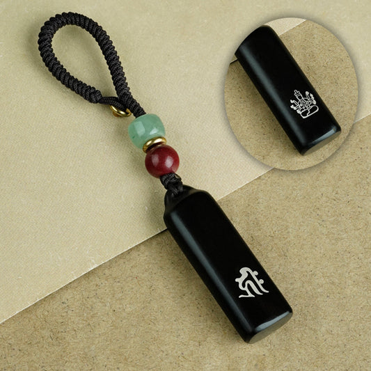 Ebony Eight Guardians talisman keychain with silver inlay for Goat and Monkey zodiac Buddhist protection