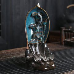 Ceramic Waterfall Backflow Incense Burner – Teal leaf vessel with smoke, Zen