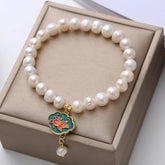 Pearl Lotus Koi Bracelet – Full bracelet front view, natural pearl charm jewelry