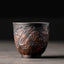 Ceramic Tea Cup – Dragon and cloud relief carving, copper tones on dark clay, traditional tea ware
