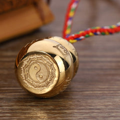 Tibetan Yin Yang Gourd Necklace - Gold barrel pendant with yin-yang engraving, braided prayer cord