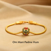 18K Gold Om Mani Padme Hum Koi Fish Bracelet – hexagonal enamel bead with red green mantra symbols on braided gold chain, beige silk