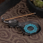 Gourd Yin Yang Bagua Incense Burner – Black gourd with turquoise Bagua and incense on fabric, copper burner