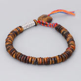 Tiger Eye Om Mani Padme Hum Bracelet - full view on gray background, tiger eye beads