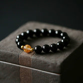 Black Obsidian White Crystal Onyx Dragon Bracelet - Black beaded bracelet with golden amber center bead on suede, Strength