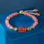 Strawberry Quartz PiXiu Bracelet – pink beads gray accents blue display, love stone