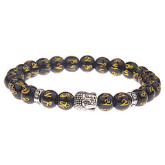 Tibetan Buddha Om Mani Padme Hum Amulet Bracelet - polished black obsidian beads engraved with gold Om Mani Padme Hum mantra, silver Buddha head amulet, silver flower spacer beads, wrist mala on white background