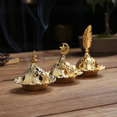 Mini Alloy Incense Burner – three gold dome burners with star, feather and spire finials, smoke trail