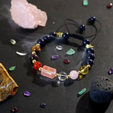 Zodiac Crystal Bracelet – Leo on dark surface with smoke effect and raw crystals, mystical