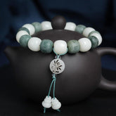 White Bodhi Seed Om Mani Padme Hum Bracelet – On Yixing teapot with lotus pendant, bodhi bead mala