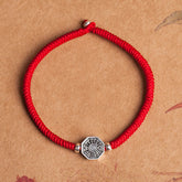 925 Sterling Silver Yin Yang Bagua Cinnabar Bracelet – Red braided cord with octagonal Bagua charm, adjustable knot, flat lay