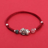 Silver PiXiu Strawberry Quartz Bracelet – Red braided bracelet with silver PiXiu on red