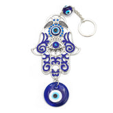 Hamsa Symbol Home Decoration – Silver keychain with blue enamel evil eye, filigree design, nazar beads