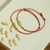 14K Gold Plated Koi Braided Bracelet – gold koi charm on red braided cord, adjustable sliding knot, luck wealth