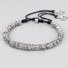 Tibetan Mantra Purity Bracelet – Adjustable black cord with engraved silver beads and vajra charms, Tibetan jewelry