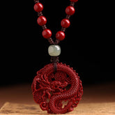 Cinnabar Hetian Jade Dragon Necklace - hand-carved dragon pendant with lucky coins, red beaded cord