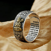 Natal Buddha Ring - Gold Buddha on oxidized silver band on dried leaves, Spiritual