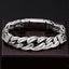 Om Mani Padme Hum Bracelet – Engraved mantra links on dark wooden stand, engraved bracelet
