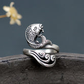 925 Sterling Silver Koi Ring – top view of polished silver koi swimming through water ripple band, wealth luck jewelry