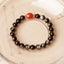 Silver Sheen Obsidian Koi Bracelet – 45-degree angle, cinnabar accent, protective obsidian jewelry