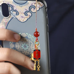 Prayer Wheel Phone Charm – Attached to decorated phone case in hand, phone accessory