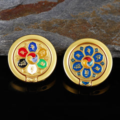 Om Mani Padme Hum Phone Ring Holder – Two gold rings with multicolor and blue mantra designs, phone grip set